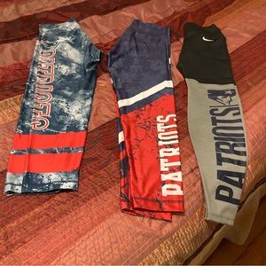 Three pair Patriots leggings, new condition. Very nice quality. Women’s Medium